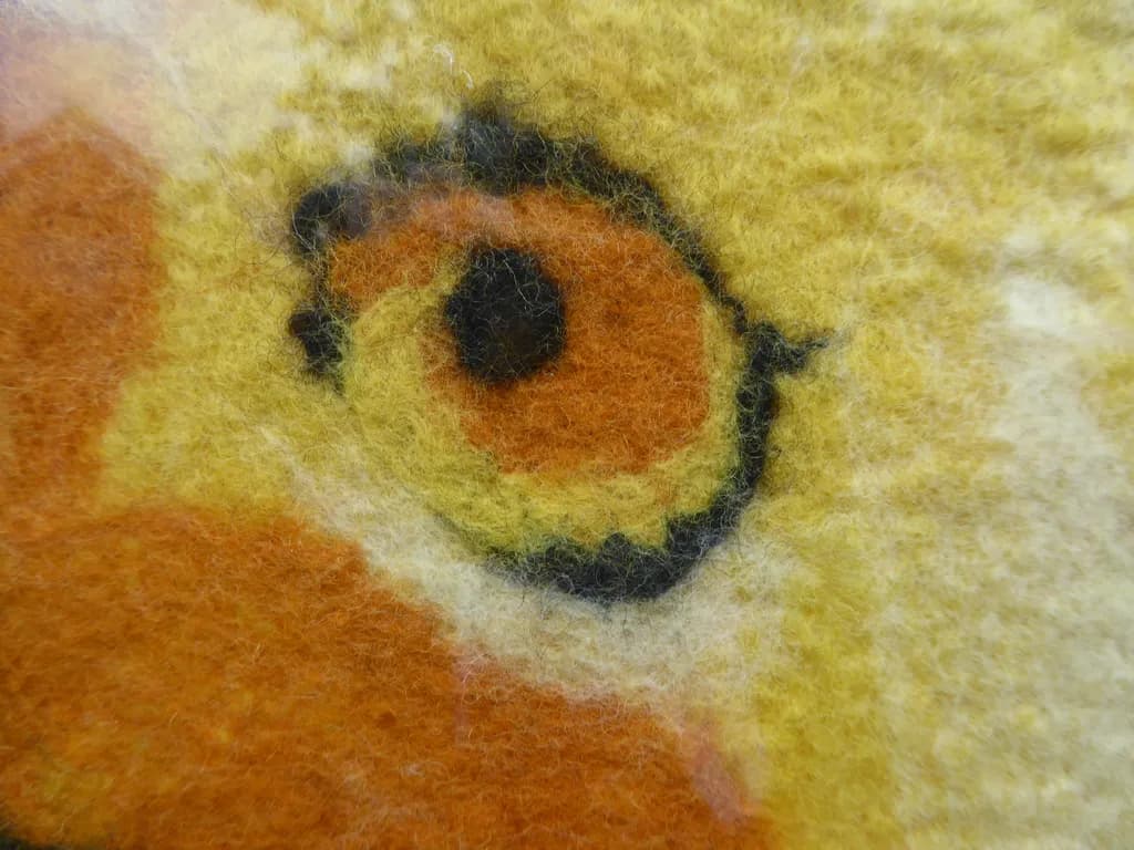 Vibrant Eye of Nature: A Felted Exploration of Color and Texture