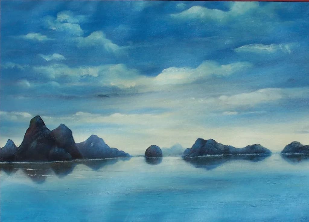 Whispers of Tranquility: A Serene Landscape of Mountains and Reflections in Blue Waters
