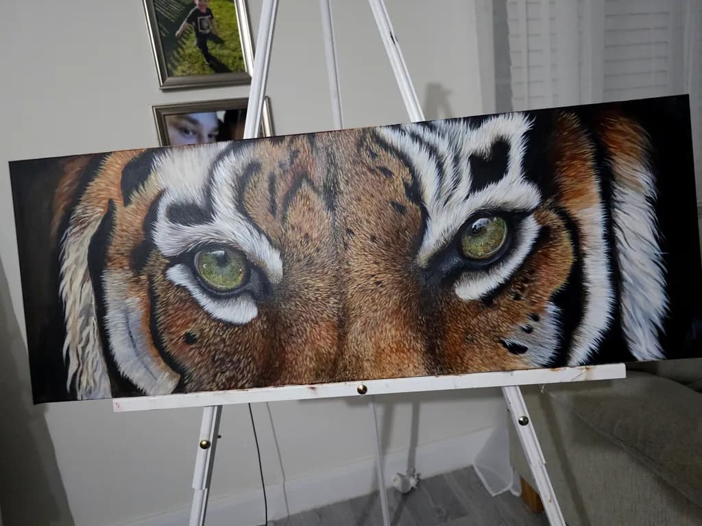 Majestic Gaze: A Close-Up Portrait of a Tiger's Intense Eyes