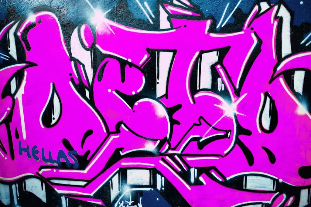 Vibrant Urban Expression: Pink Graffiti Masterpiece