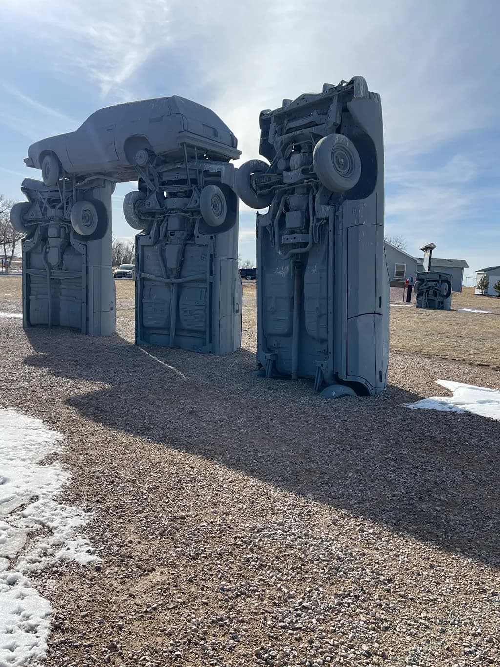"Gravity's Reversal: A Sculptural Exploration of Automotive Deconstruction"