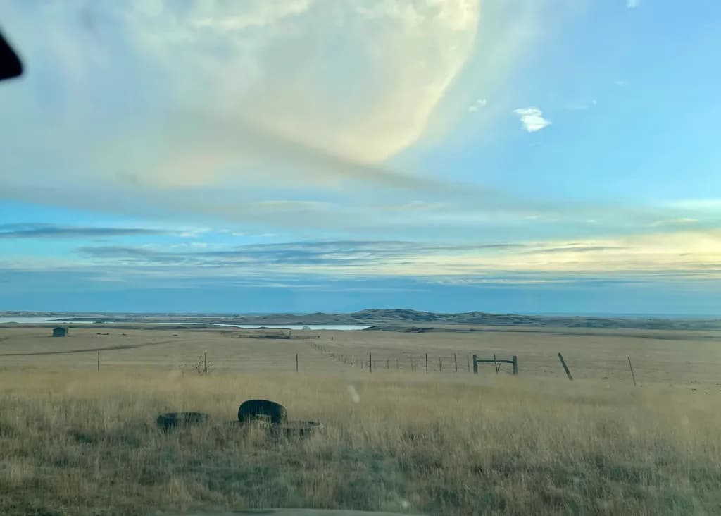 Whispers of Tranquility: A Serene Landscape of Sky and Water
