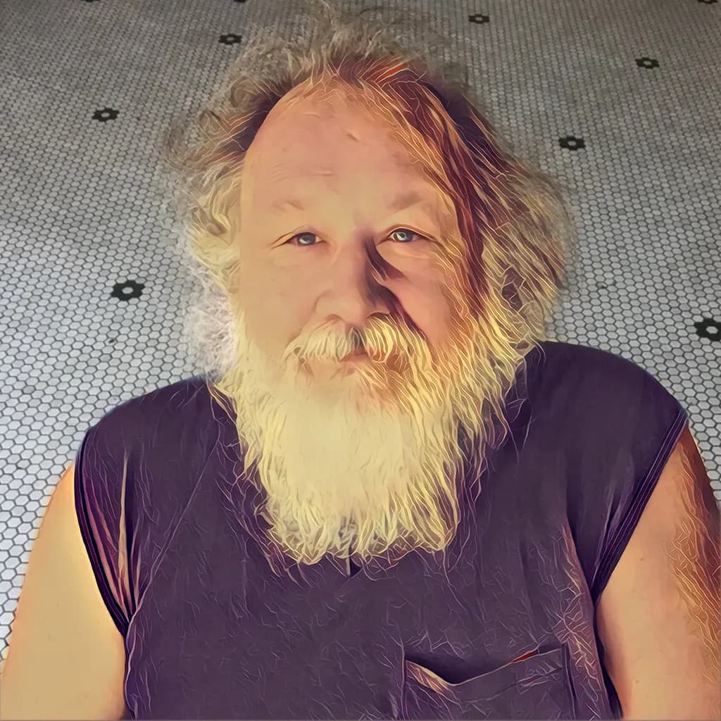 Whimsical Portrait of a Bearded Smile: Embracing Casual Charm and Textured Light