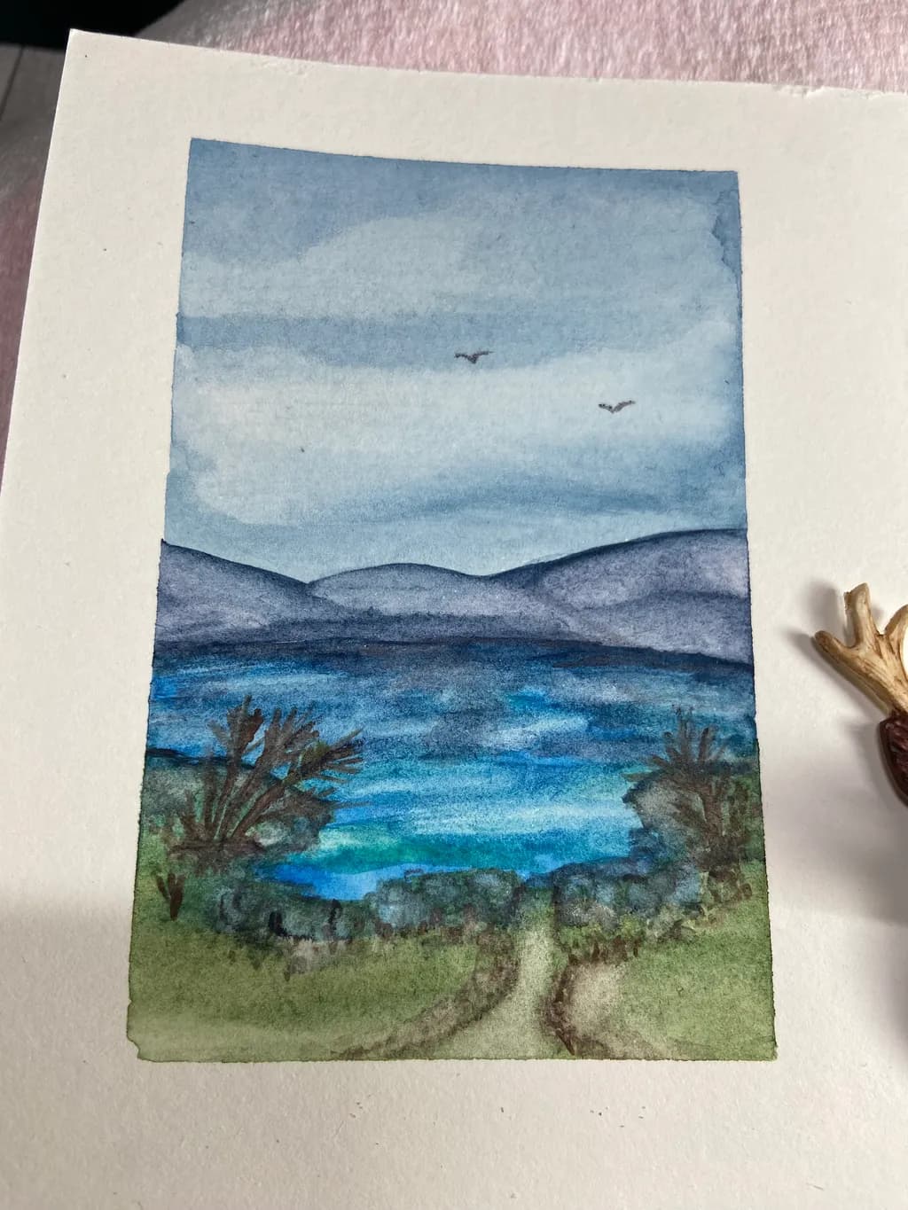 Whispers of Tranquility: A Serene Watercolor Landscape of Hills and Sky
