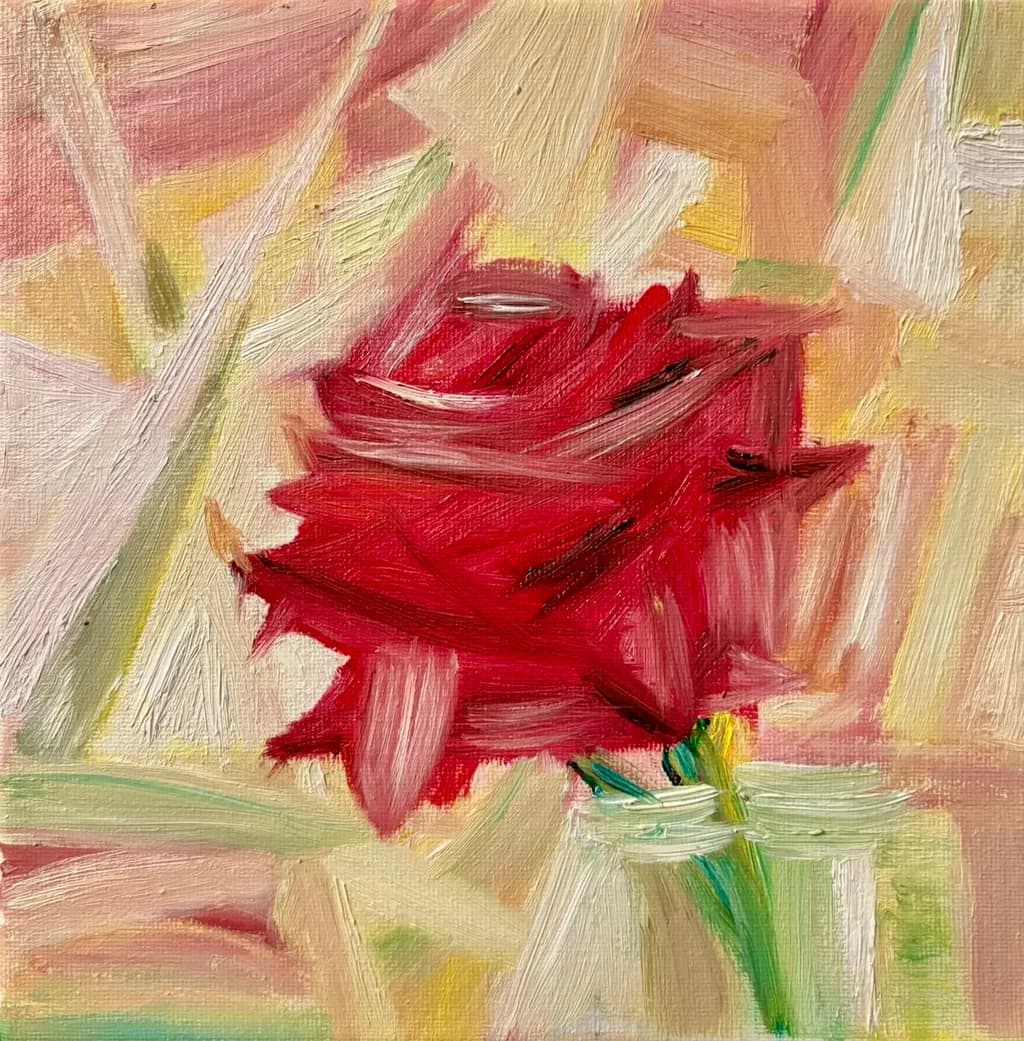 Crimson Whispers: A Bold Rose Amidst Soft Hues