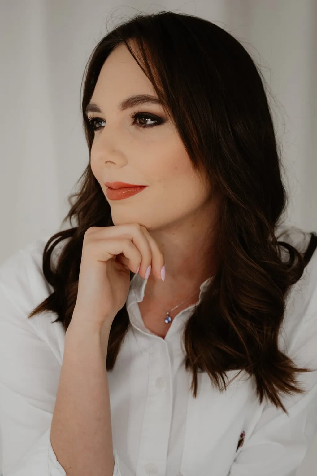 Contemplative Elegance: A Portrait of Grace and Poise