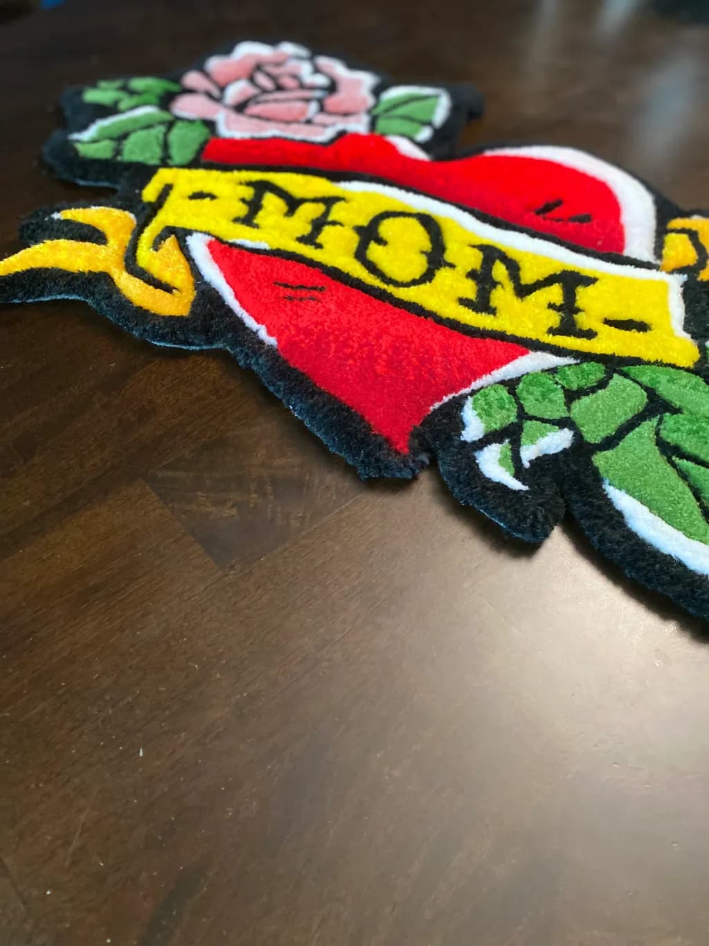 Heartfelt Tribute: Vibrant "Mom" Tattoo-Inspired Rug with Floral Accents