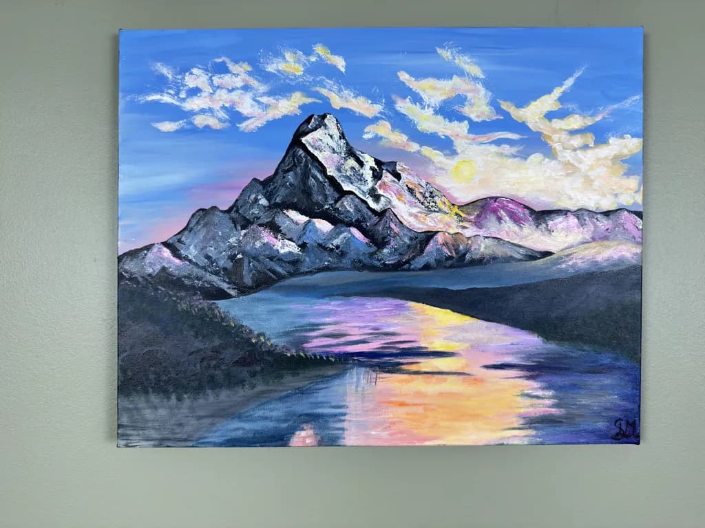 Majestic Mountain Reflections: A Serene Sunset Over Tranquil Waters