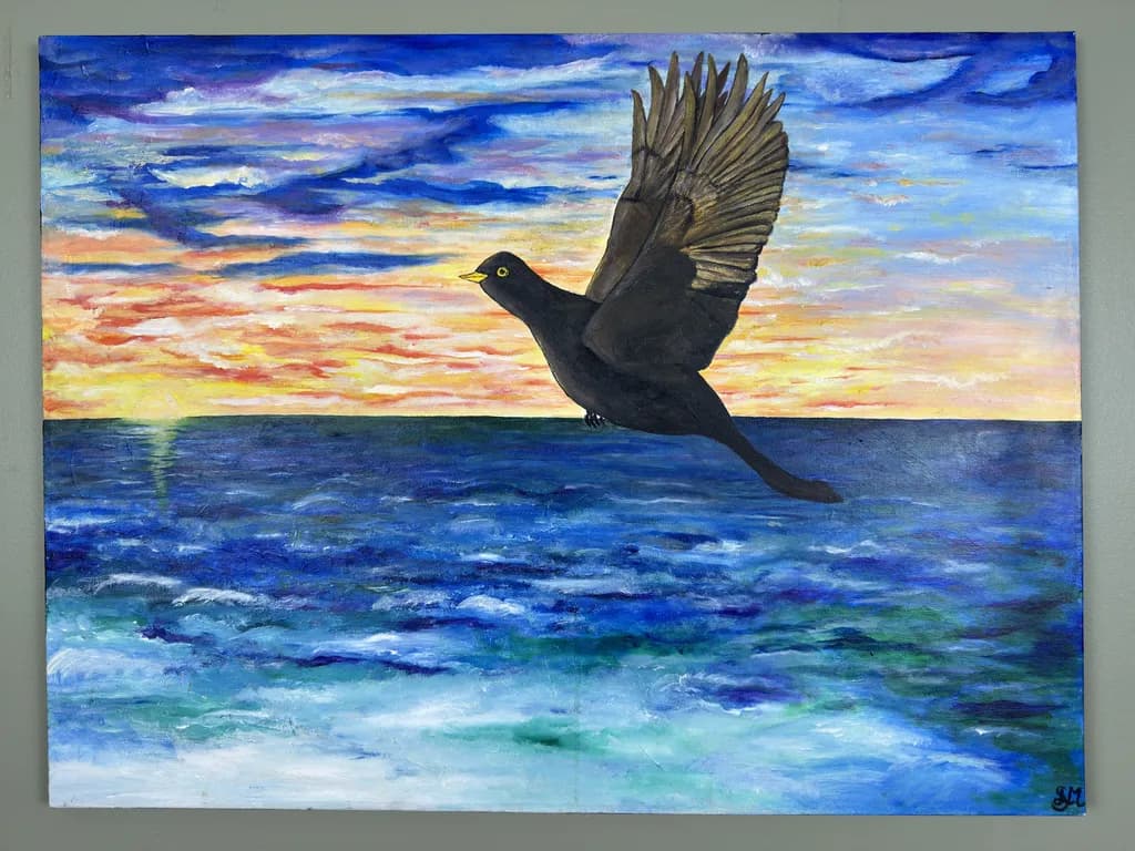 Ethereal Flight: A Black Bird Soars Over a Vibrant Ocean Sunset