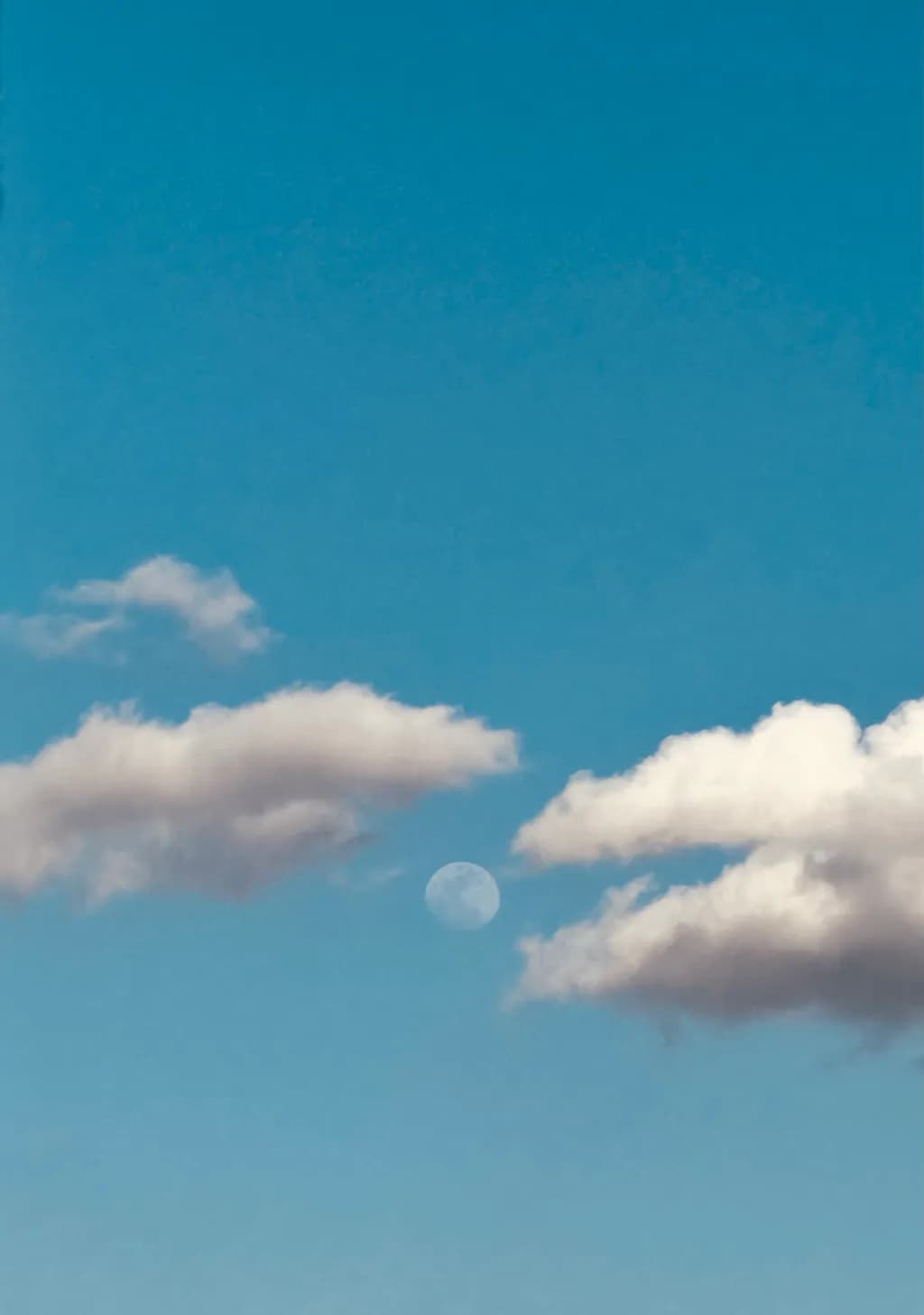Whispers of the Moon: A Serene Sky Embrace