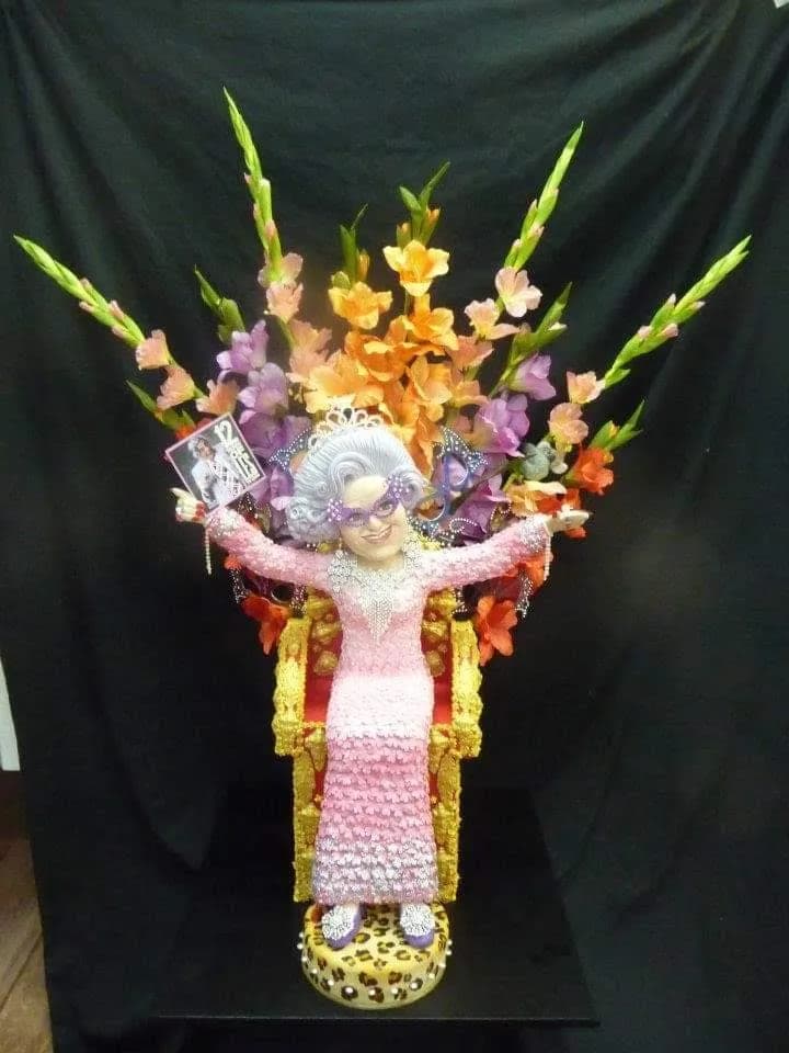 Regal Glamour: A Whimsical Floral Queen in Sparkling Elegance