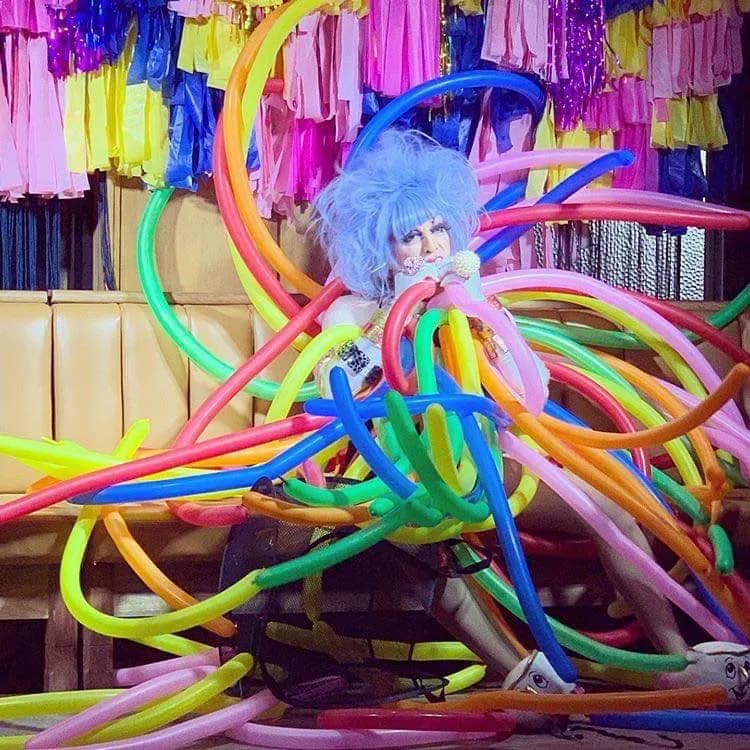 Vibrant Chaos: A Playful Exploration of Color and Identity in Balloon Artistry