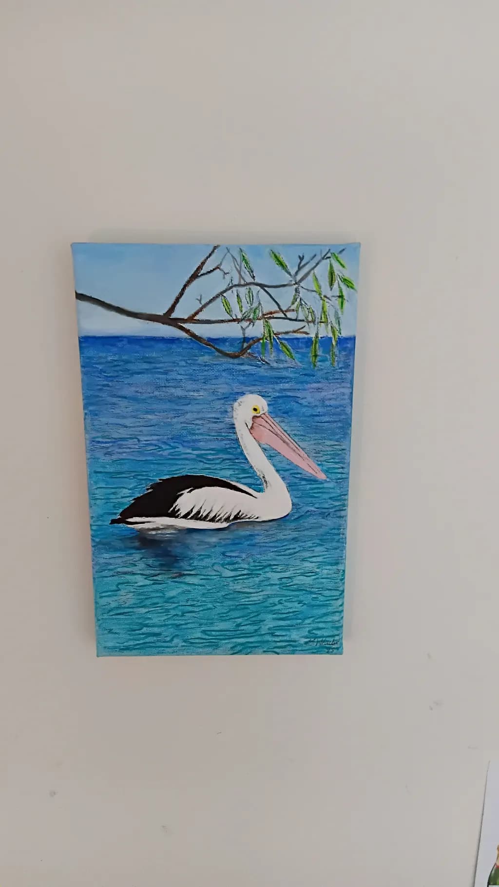 Serenity in Blue: A Pelican's Tranquil Waterscape