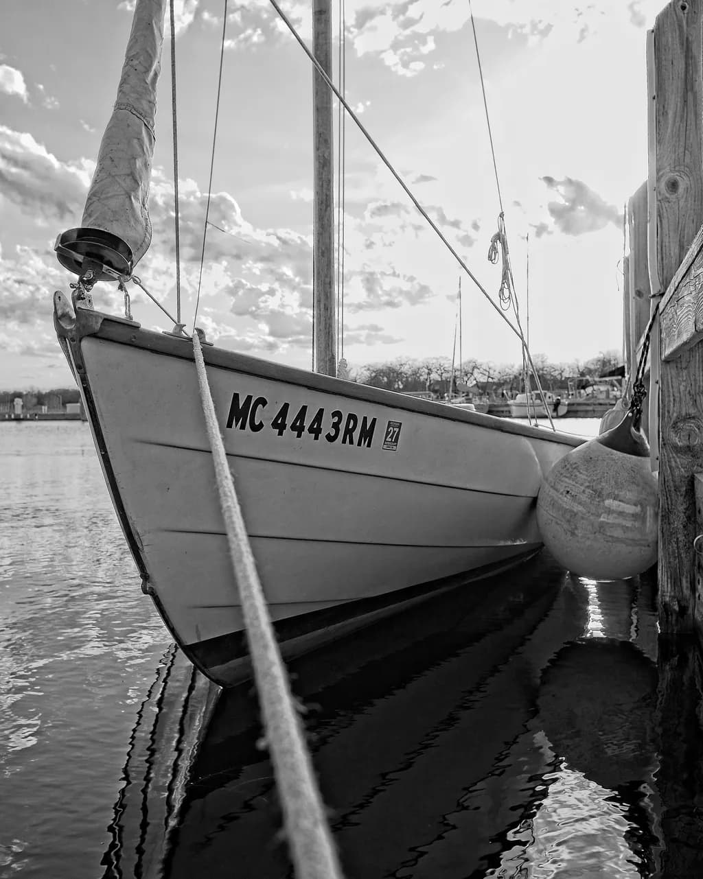 Docked Sailboat Reflection
