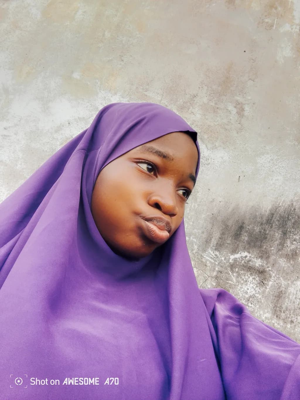 Whispers of Elegance: A Portrait in Purple Serenity