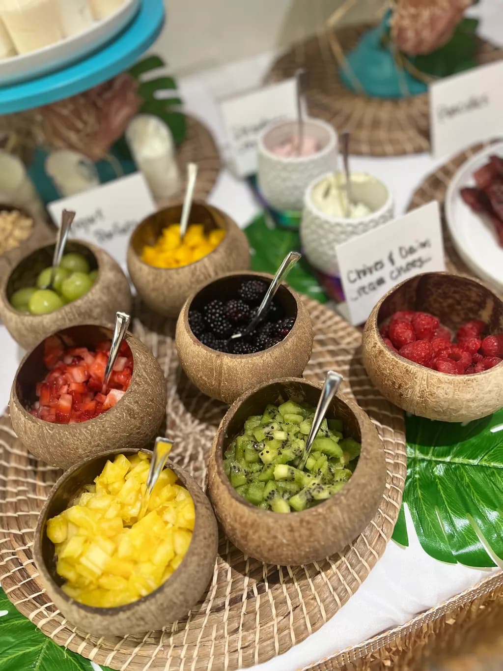 Tropical Fruit Medley: A Colorful Display of Nature's Sweetness in Coconut Bowls