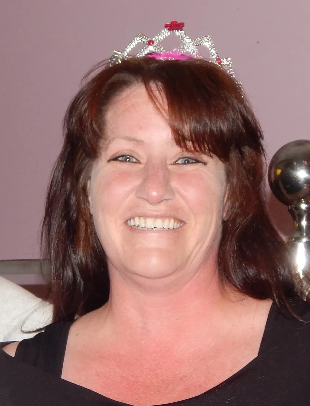 Joyful Celebration: A Portrait of Happiness in a Tiara