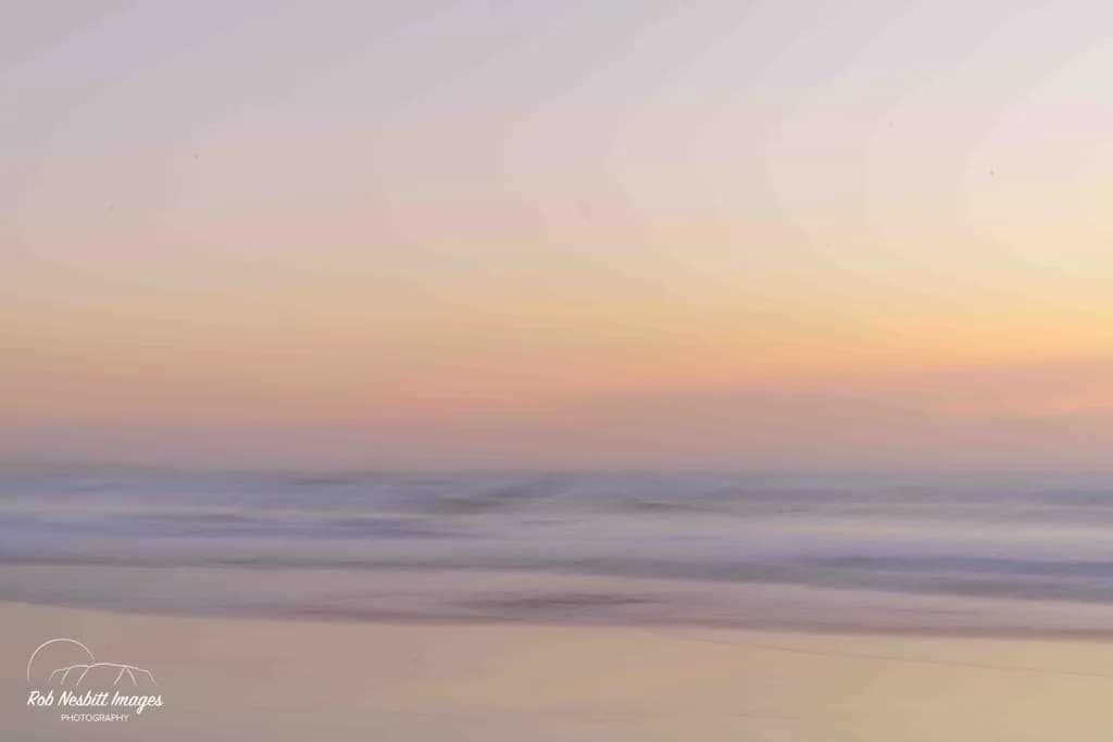 Whispers of Dawn: A Serene Coastal Embrace
