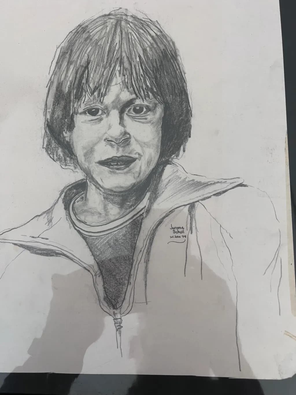 Whispers of Youth: A Charcoal Portrait of Innocence and Expression