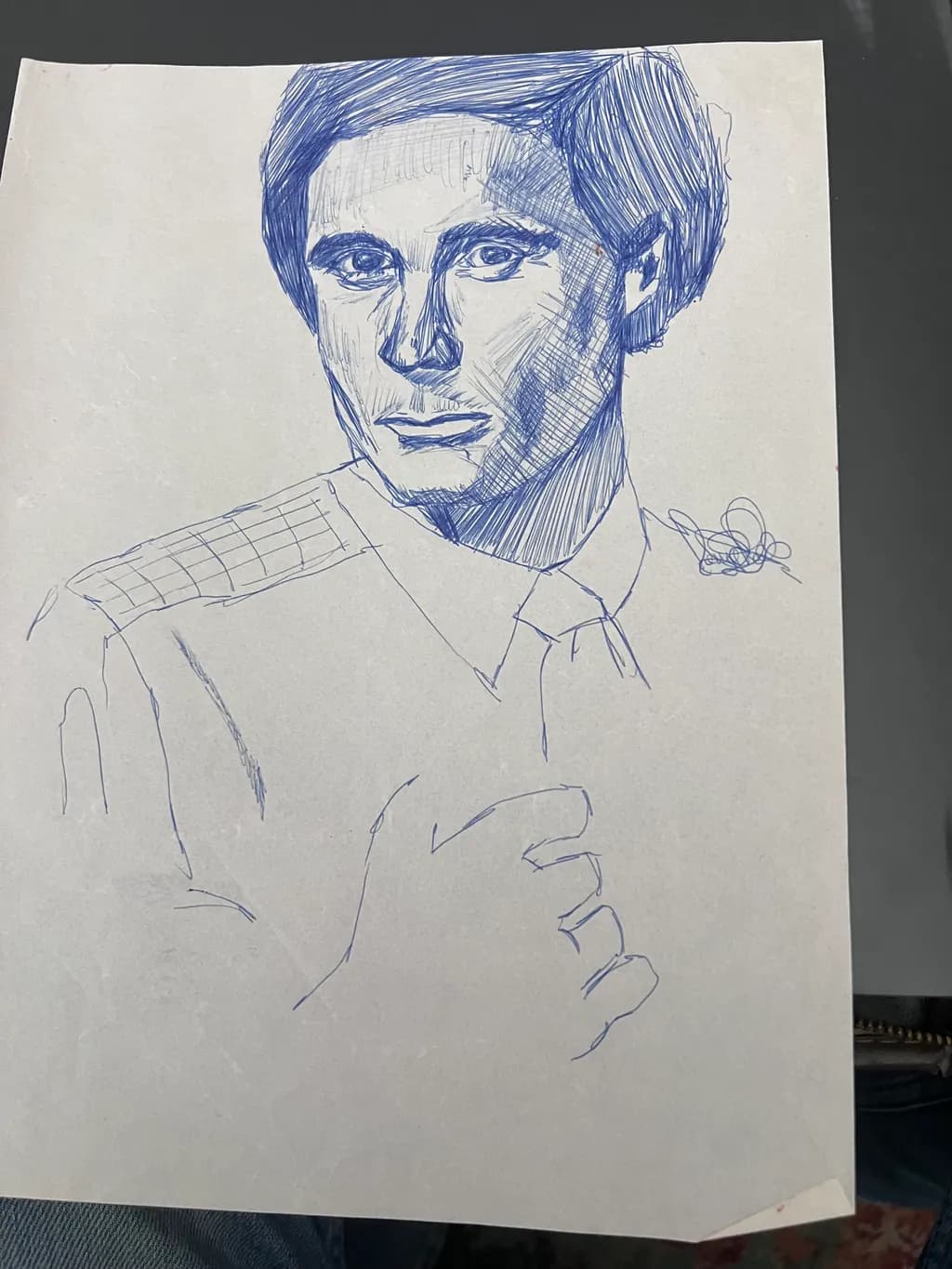 Timeless Gaze: A Blue Ink Portrait of Contemplation