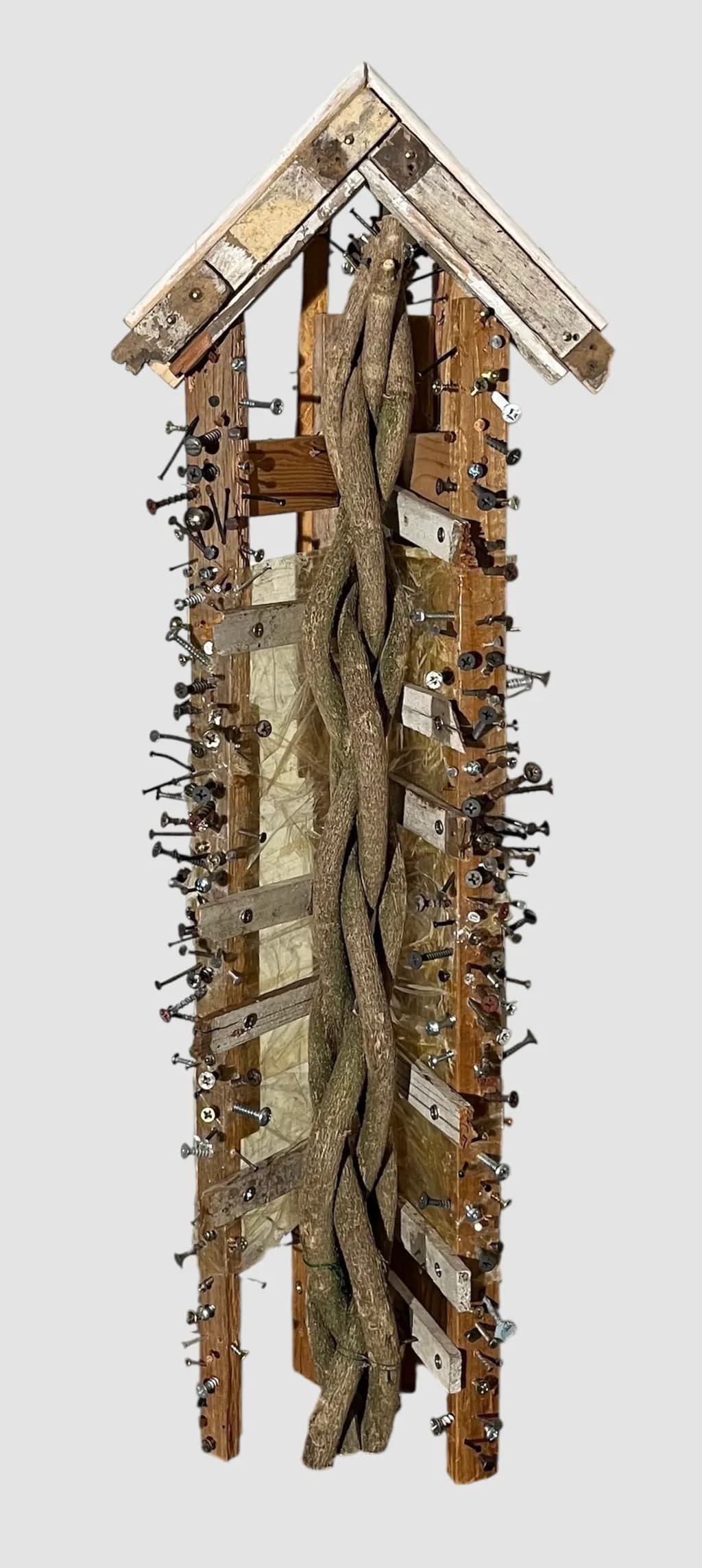 Whispers of Nature: A Sculptural Journey Through Twisted Wood and Metal Elements