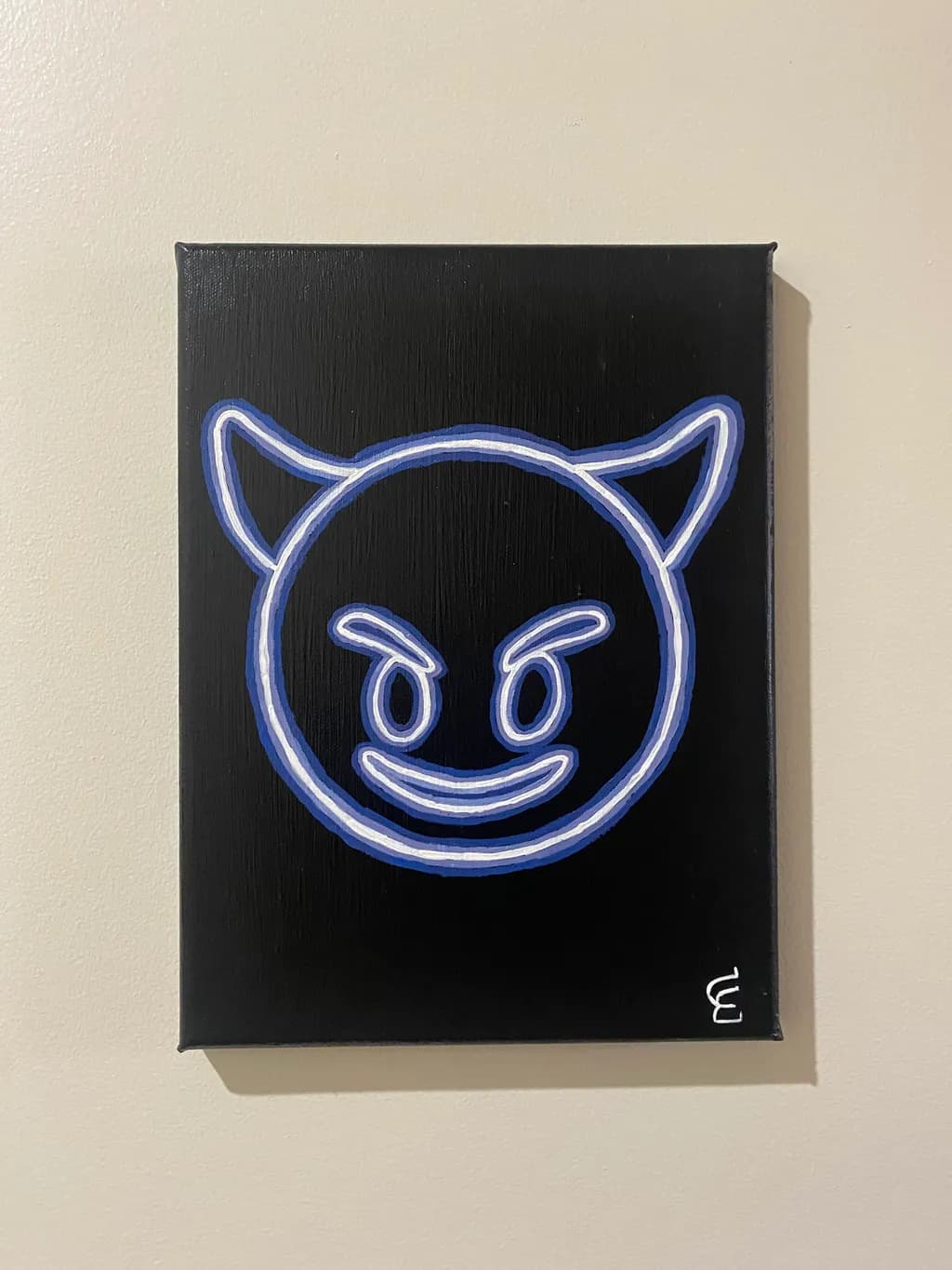 Neon Mischief: A Playful Devil's Expression on Black Canvas