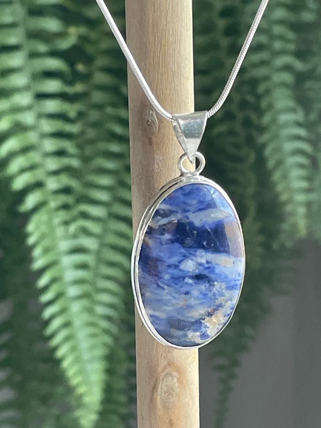 Celestial Harmony: Handcrafted Blue Stone Pendant in Silver Setting