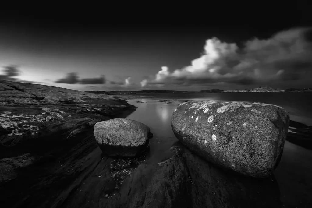 Whispers of Time: Monochrome Serenity by the Shoreline