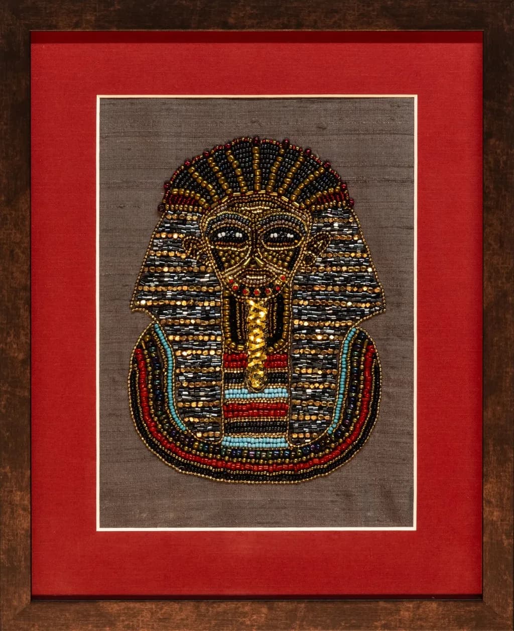 Ancient Elegance: Beaded Pharaoh's Mask in Ornate Frame