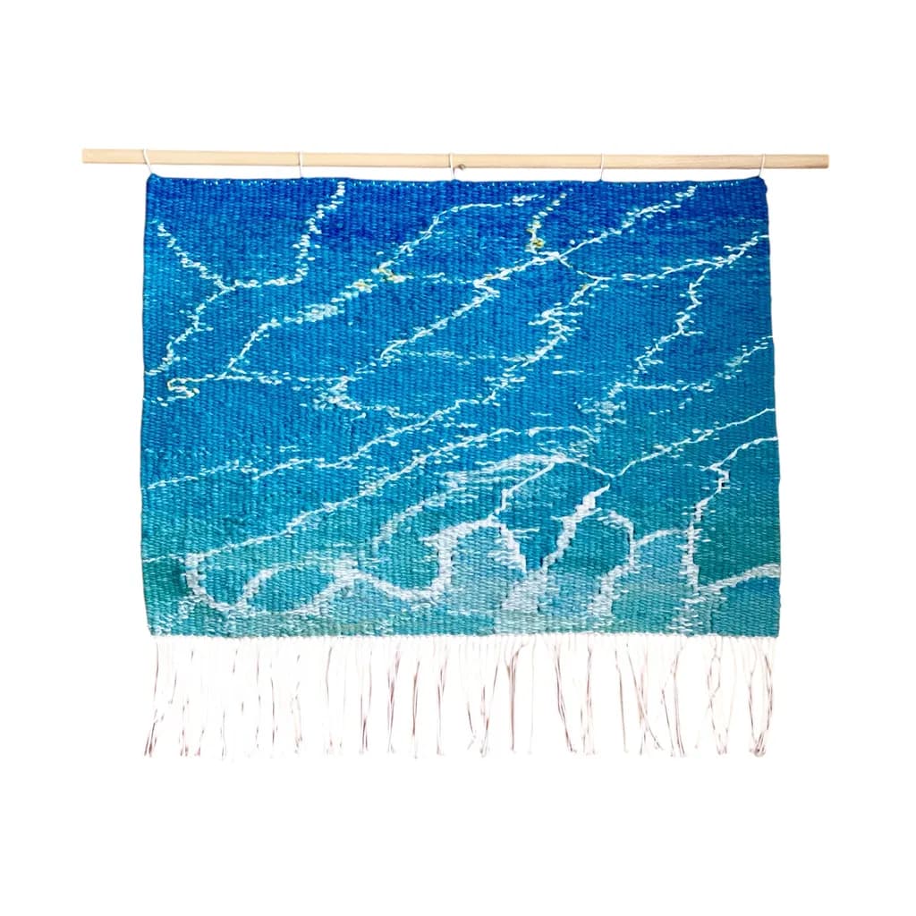 Ocean's Whisper: A Handwoven Tapestry Capturing the Dance of Waves in Serene Blues