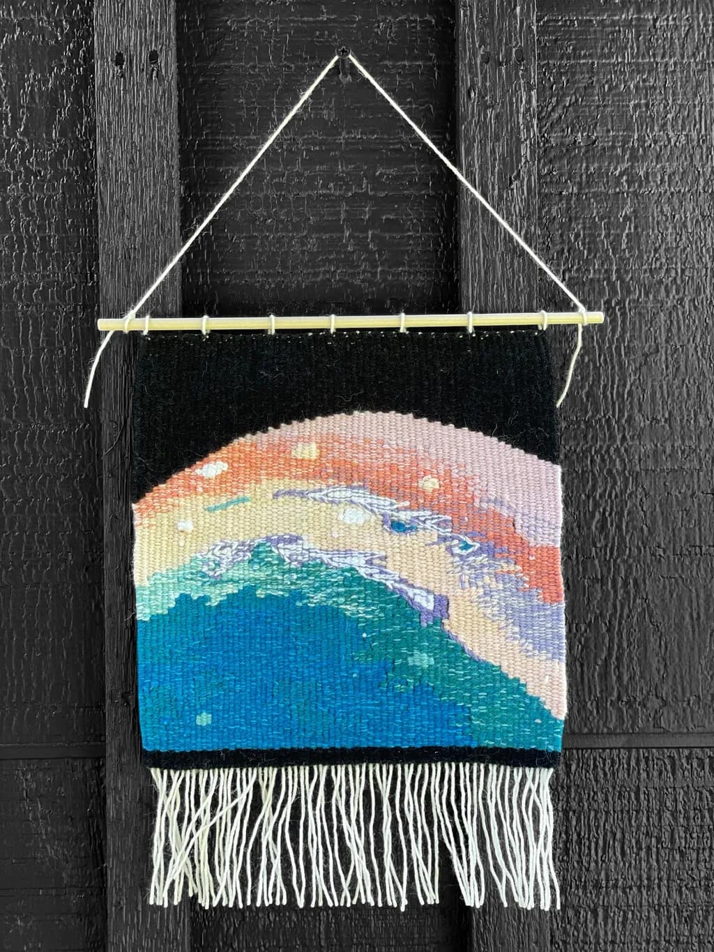 Colorful Abstract Textile Wall Art: Handmade Woven Tapestry with Vibrant Patterns and Fringed Detail