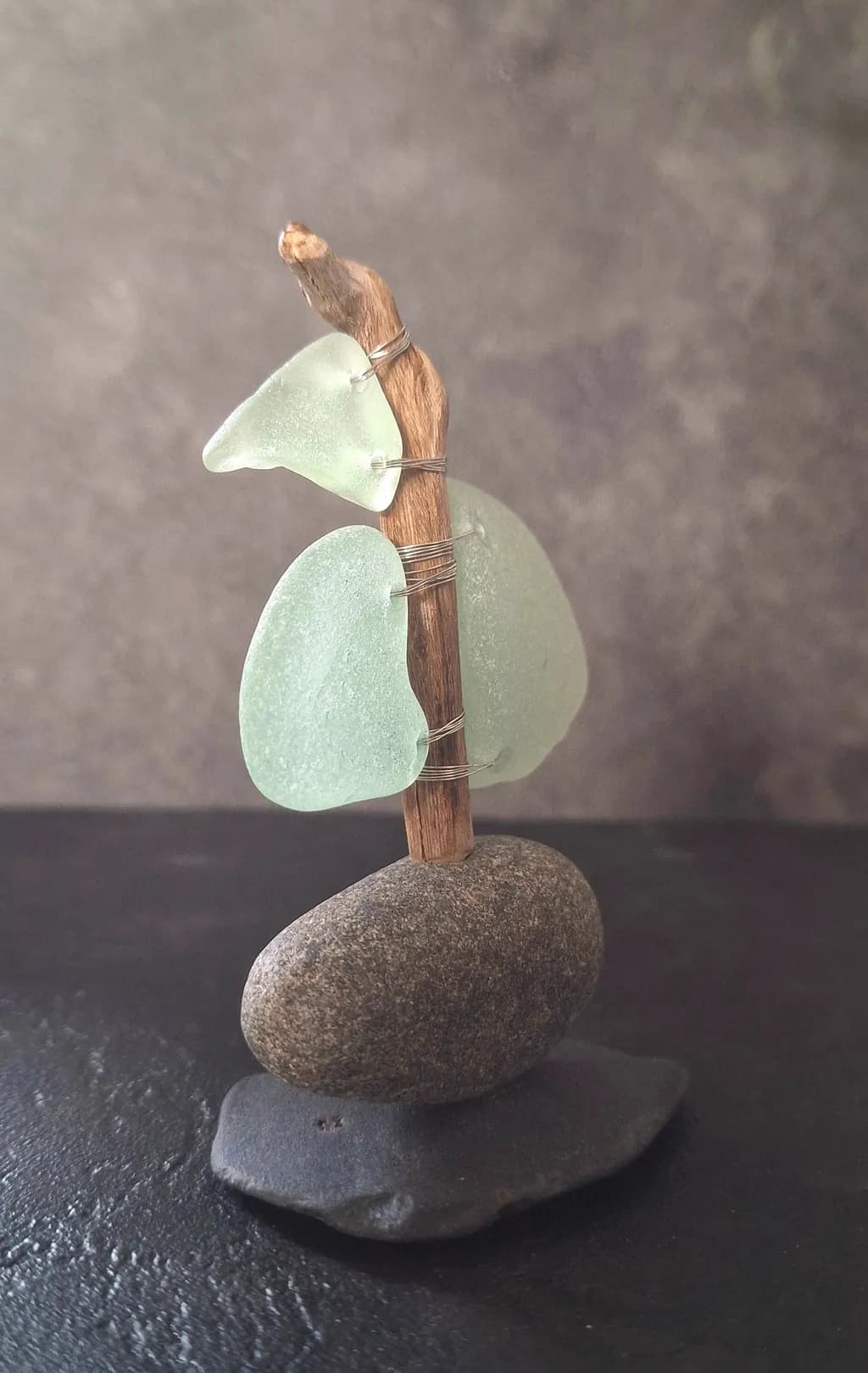 Serenity in Balance: A Coastal Sculpture of Sea Glass and Stone