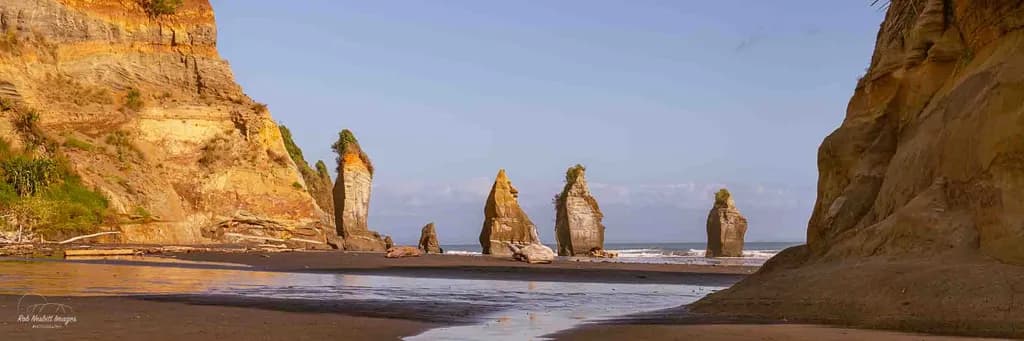 Whispers of Time: The Majestic Rock Formations at Sunset Beach