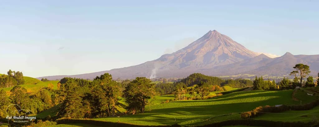 Majestic Eruption: The Serenity of Mount Taranaki at Dawn
