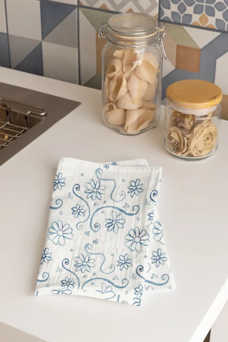 Whimsical Floral Dance: Handcrafted Kitchen Towel with Blue Flower Design