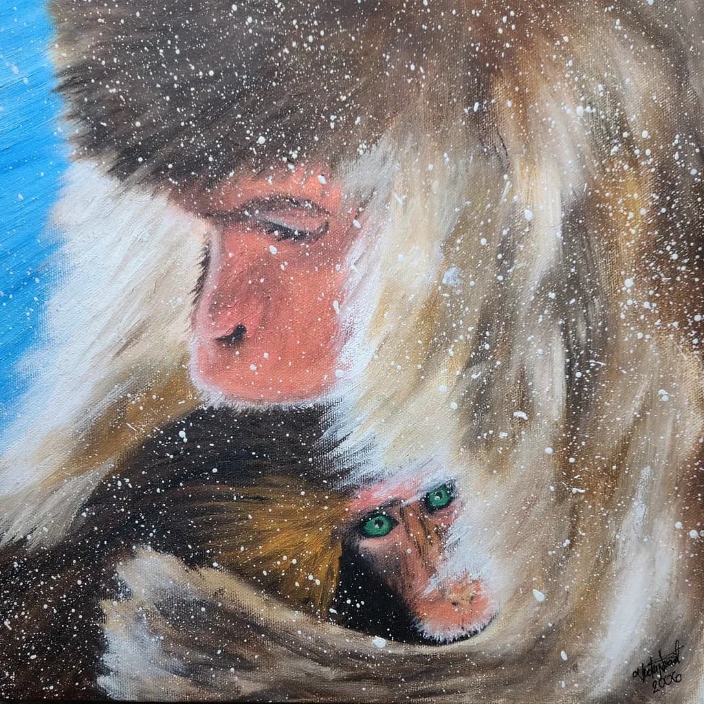 Whispers of Winter: A Mother and Child Monkey Embrace in Snowy Serenity