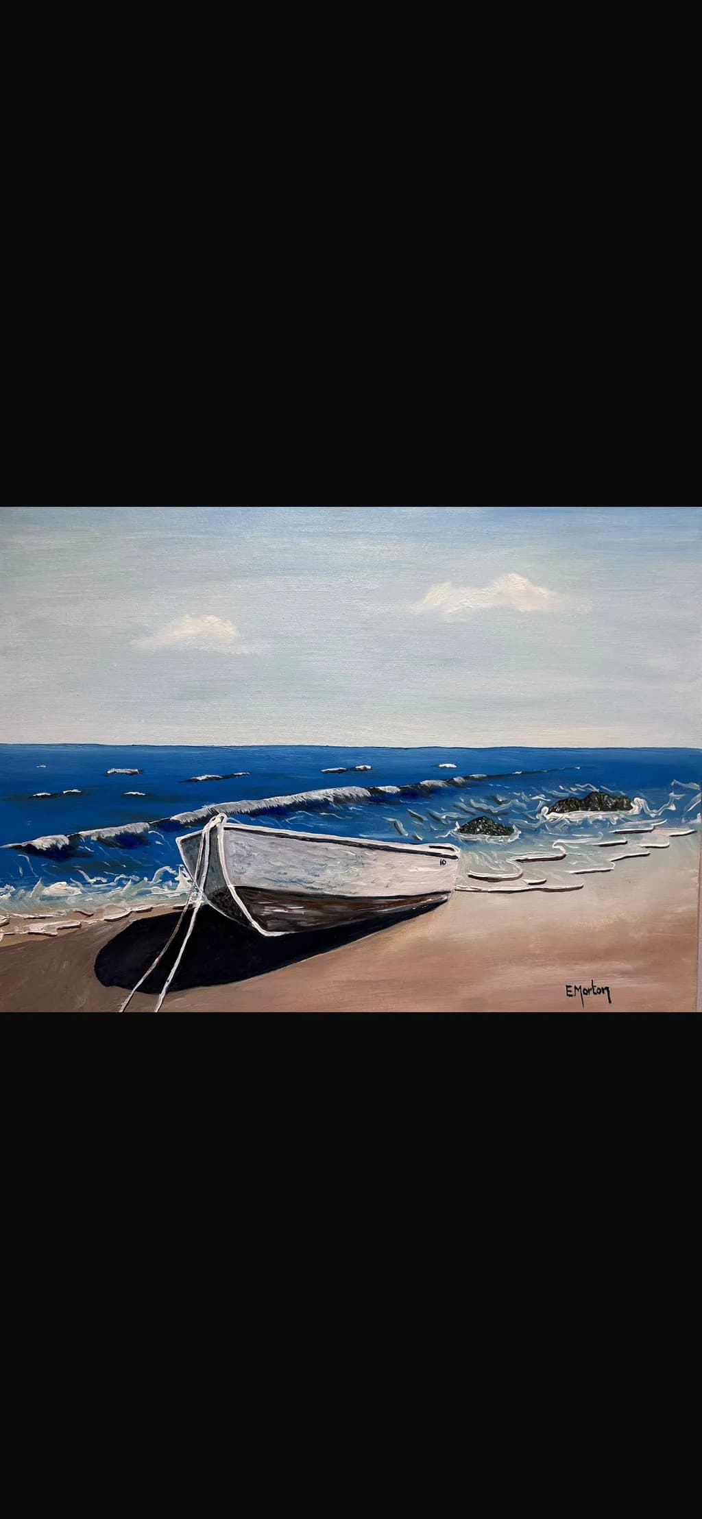 Serenity by the Shore: A Tranquil Beach Scene with a Weathered Boat