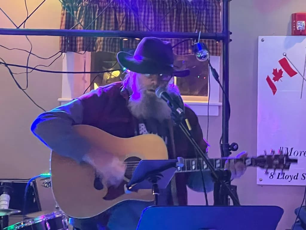 Melodies Under the Neon: A Night of Acoustic Storytelling