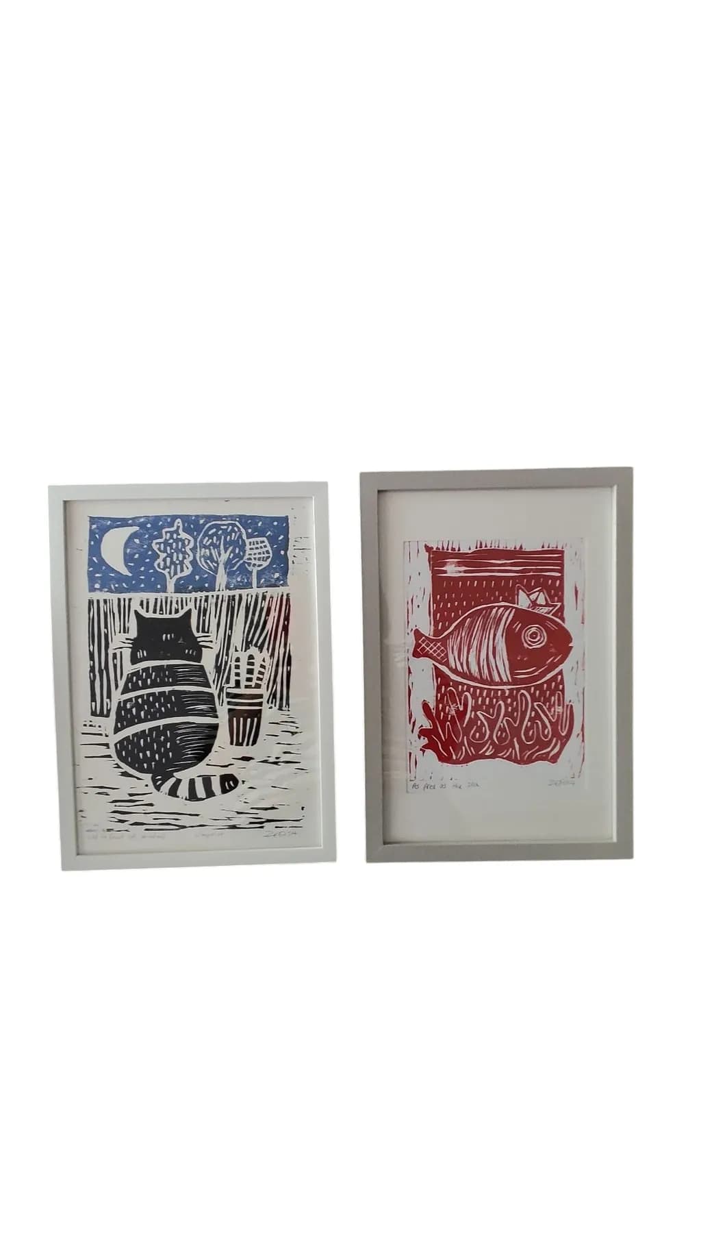 Whimsical Reflections: A Cat and Fish Duo in Bold Linocut Art
