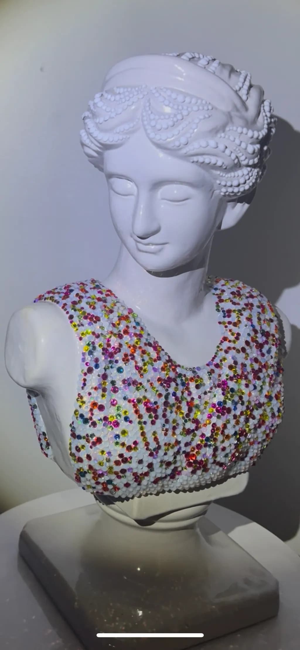 Radiant Elegance: A Bejeweled Bust of Timeless Beauty