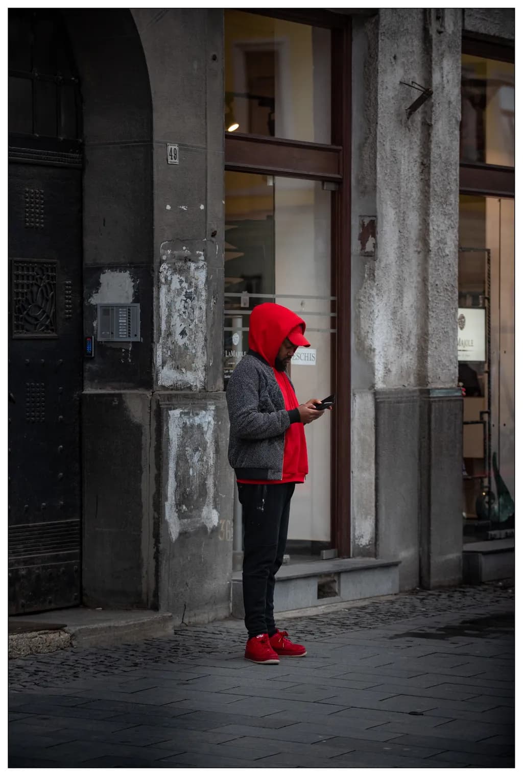 Urban Solitude: A Fashionable Moment in the Cityscape