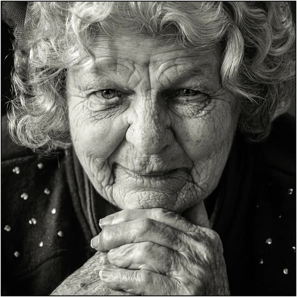 Whispers of Time: A Portrait of Resilience and Grace in Black and White