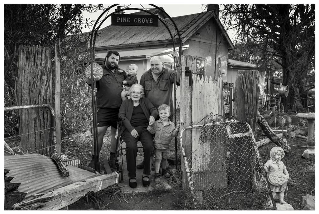 Family Ties at Pine Grove: A Timeless Black and White Portrait of Generations Together