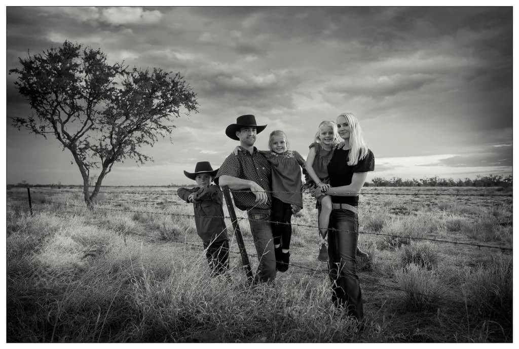 Western Family Portrait in Black and White: A Timeless Connection to Nature and Heritage
