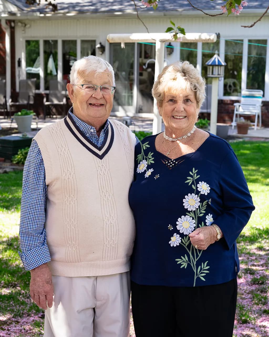 Joyful Togetherness: A Cherished Portrait of Love Amidst Blossoms