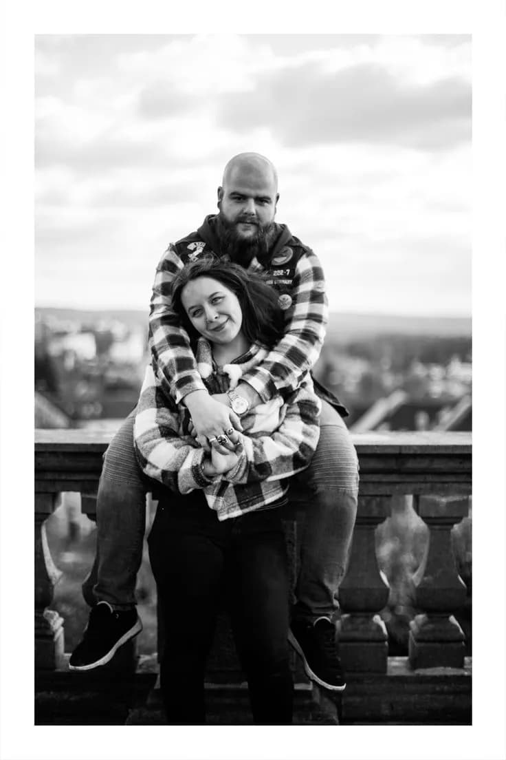 Embracing Moments: A Black and White Love Story in the Cityscape