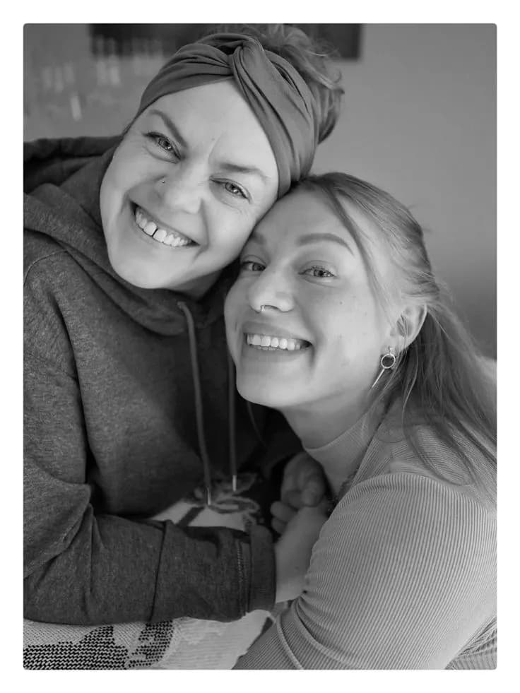 Joyful Embrace: A Heartwarming Moment of Connection in Black and White Photography