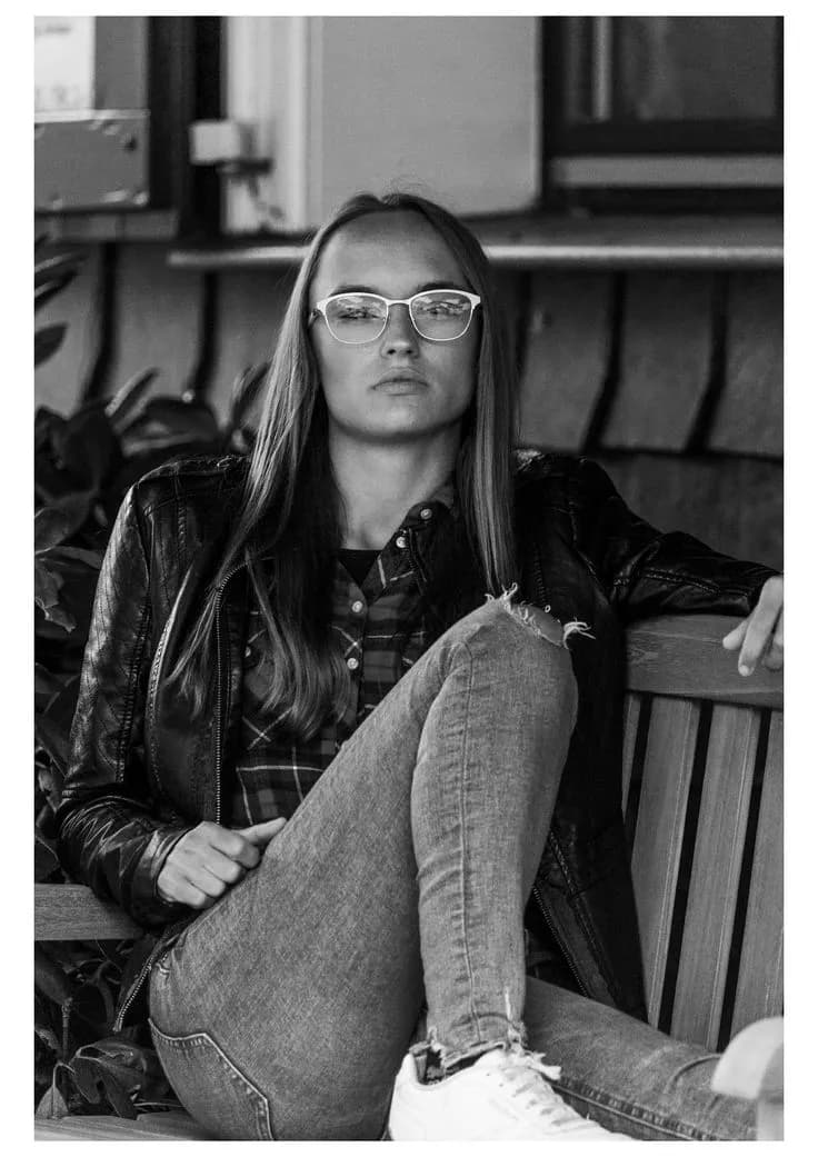 Monochrome Confidence: A Contemplative Portrait of Stylish Relaxation