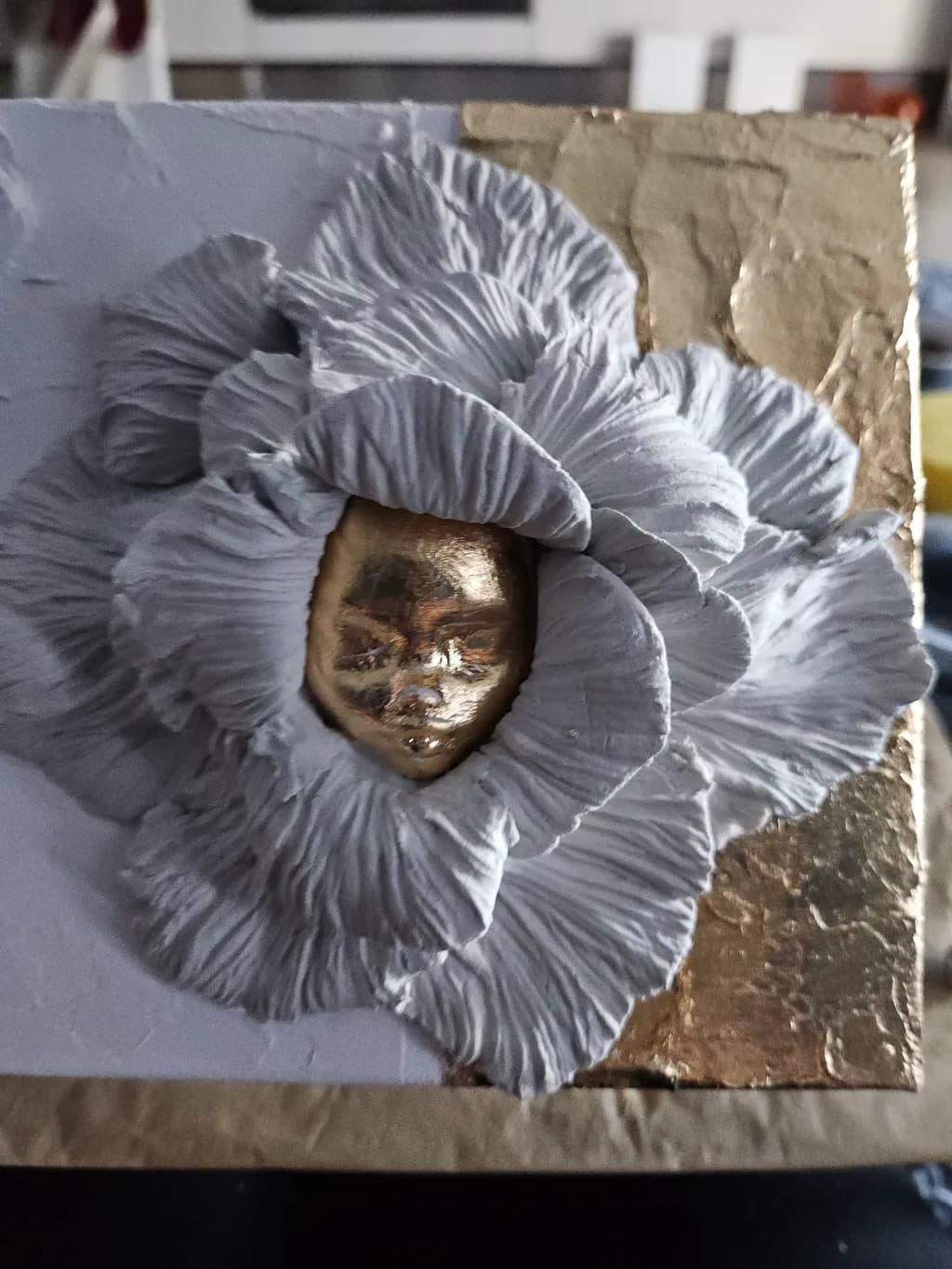 Whispers of Elegance: A Metallic Floral Sculpture Embracing Texture and Beauty