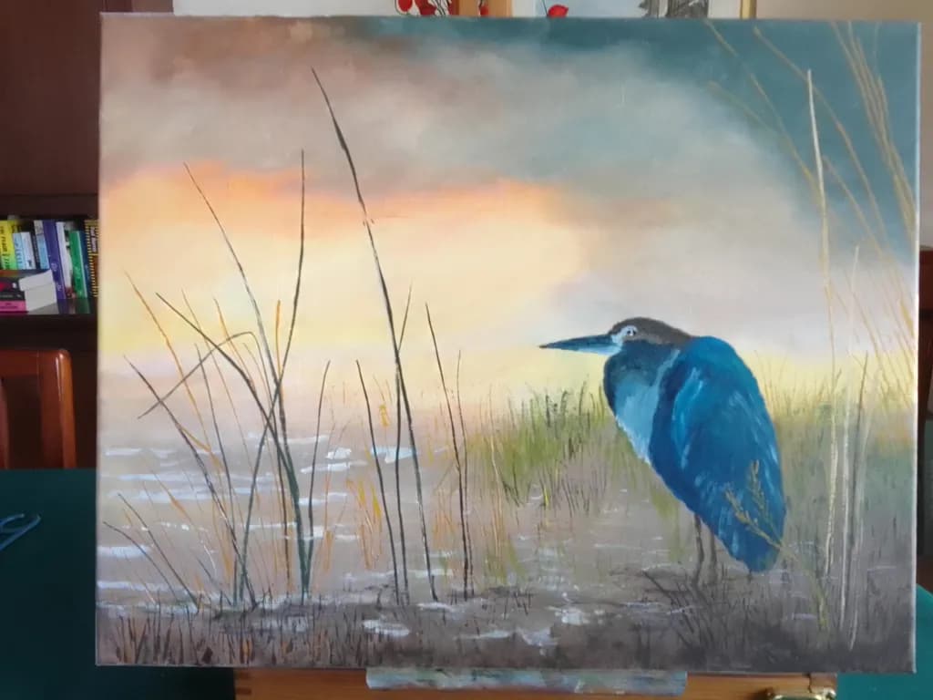 Serenity at Dusk: A Majestic Heron in Tranquil Waterscape